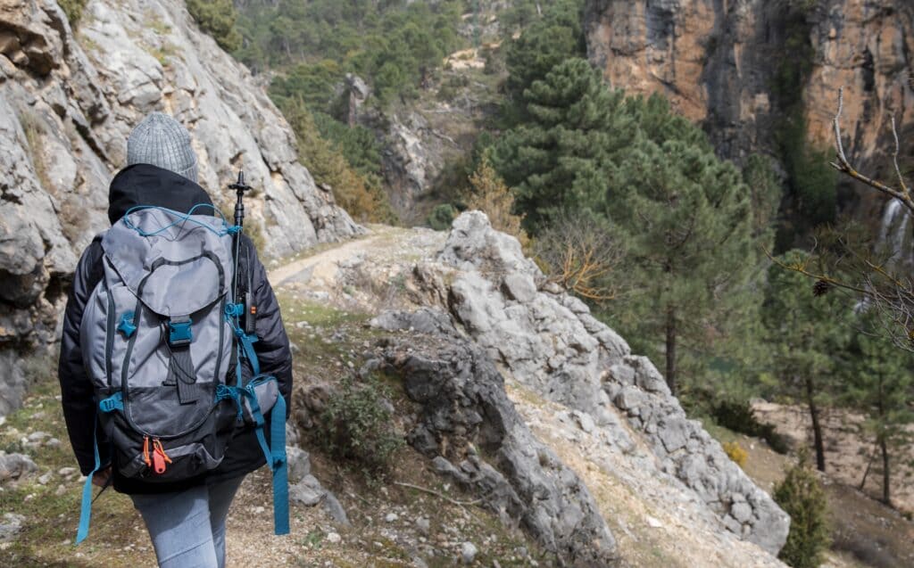 A person climbing a mountain