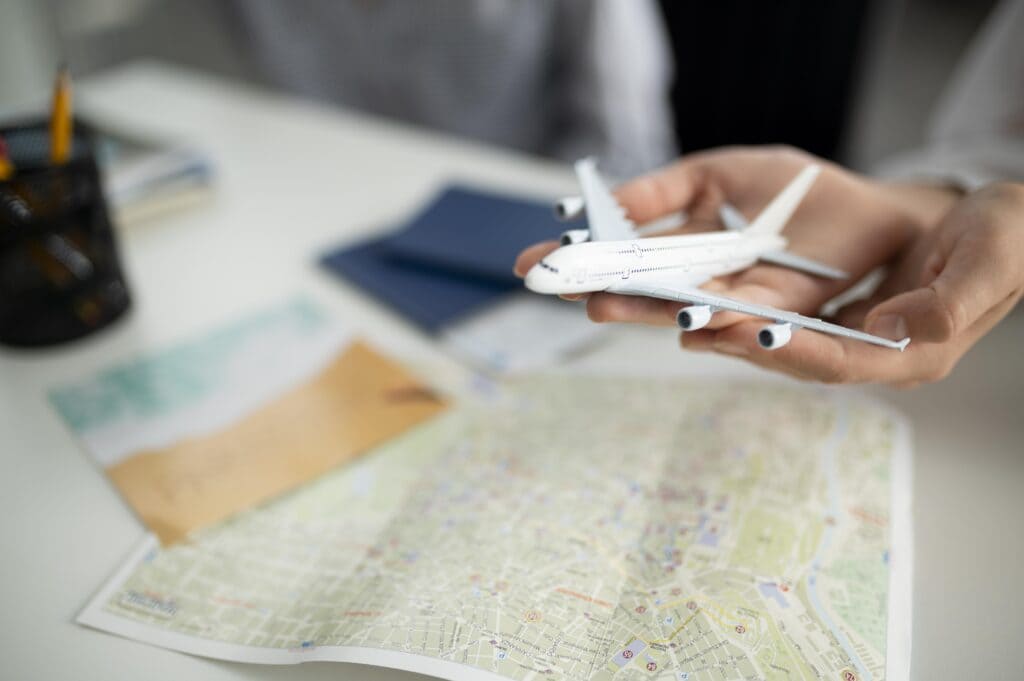 A man holding a plane in his hands